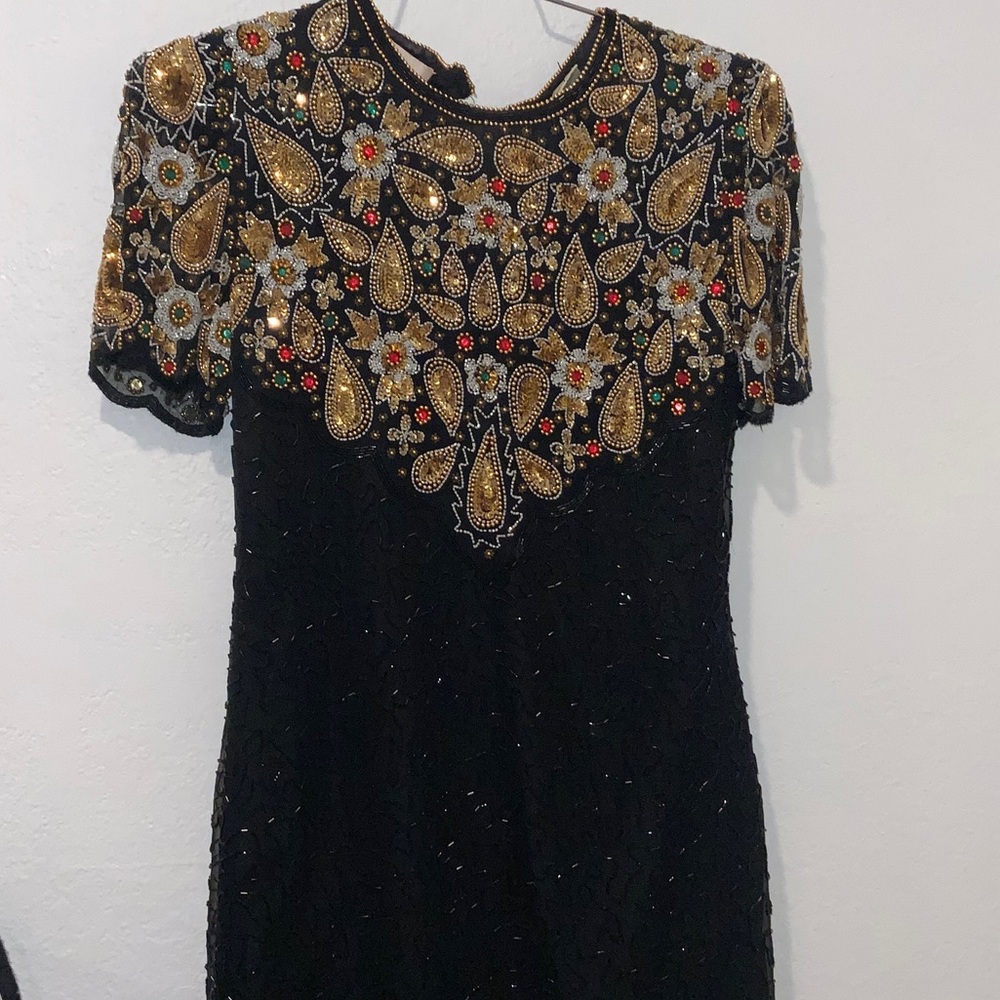 Embellished Black Dress with Gold and Red Accents